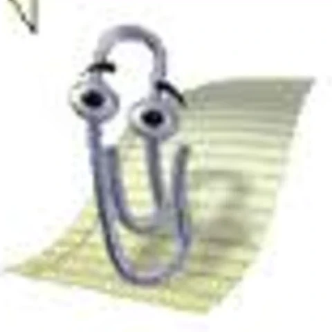 Animierte Büroklammer mit Augen (Clippy) auf einem Notizblatt